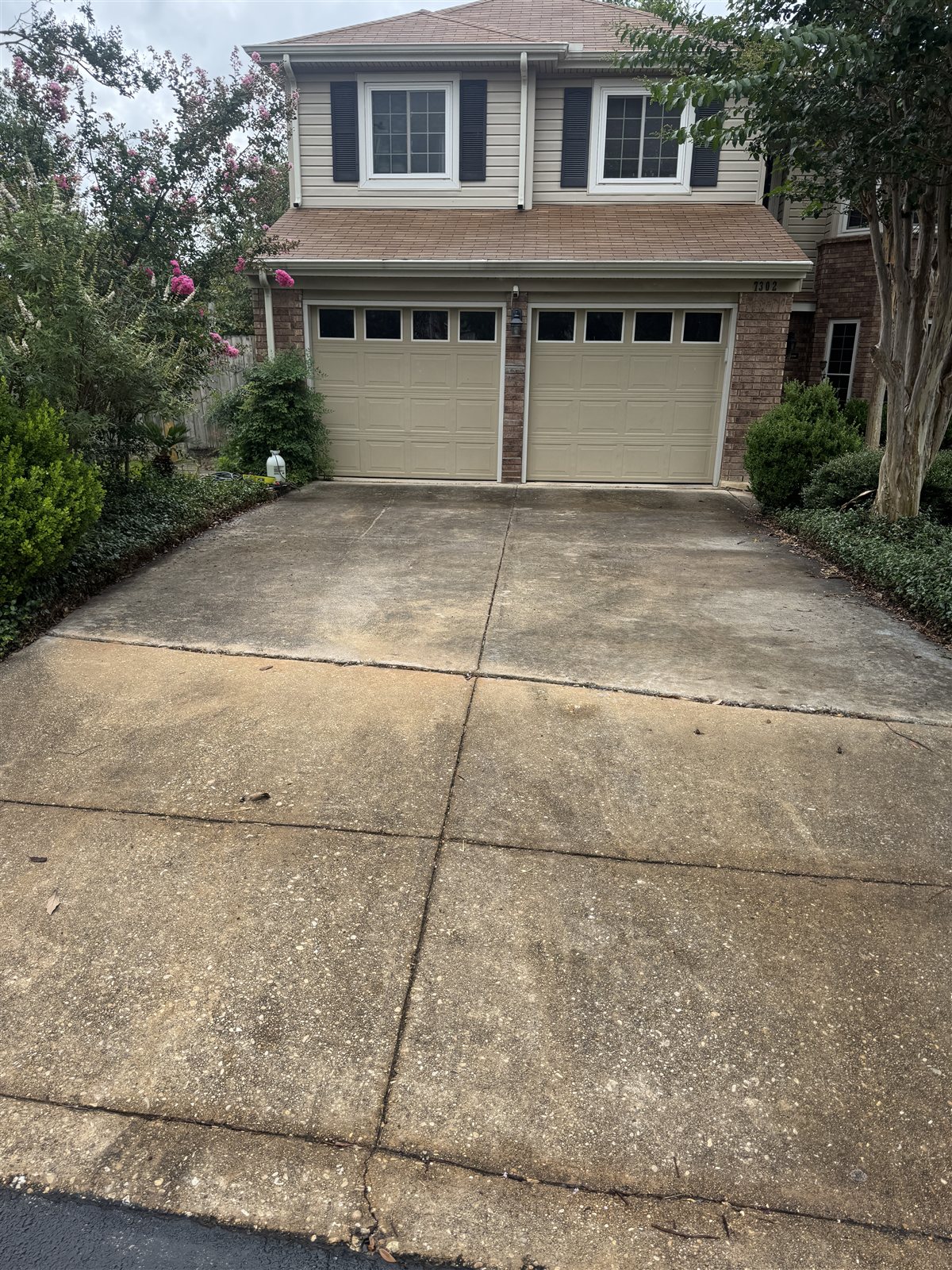Residential Driveway before pressure washing in San Antonio